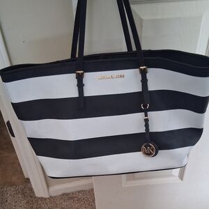 Michael Kors Navy Blue and White Striped Tote with Gold Accents.